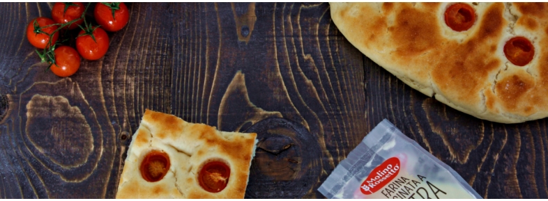 Apulian cappelli wheat flat bread with cherry tomatoes